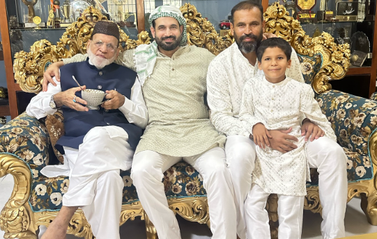 Irfan Pathan sitting on Sofa with his Father and Brother